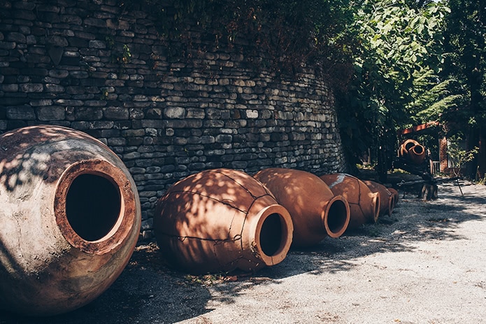 Georgian wine is traditionally vinified in clay amphorae (quevri), which are placed in the ground.