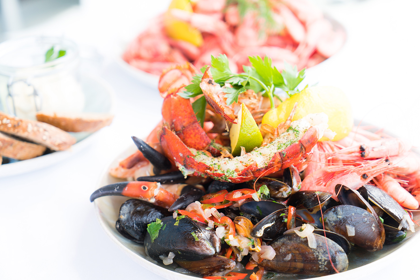 Various seafood on a white plate