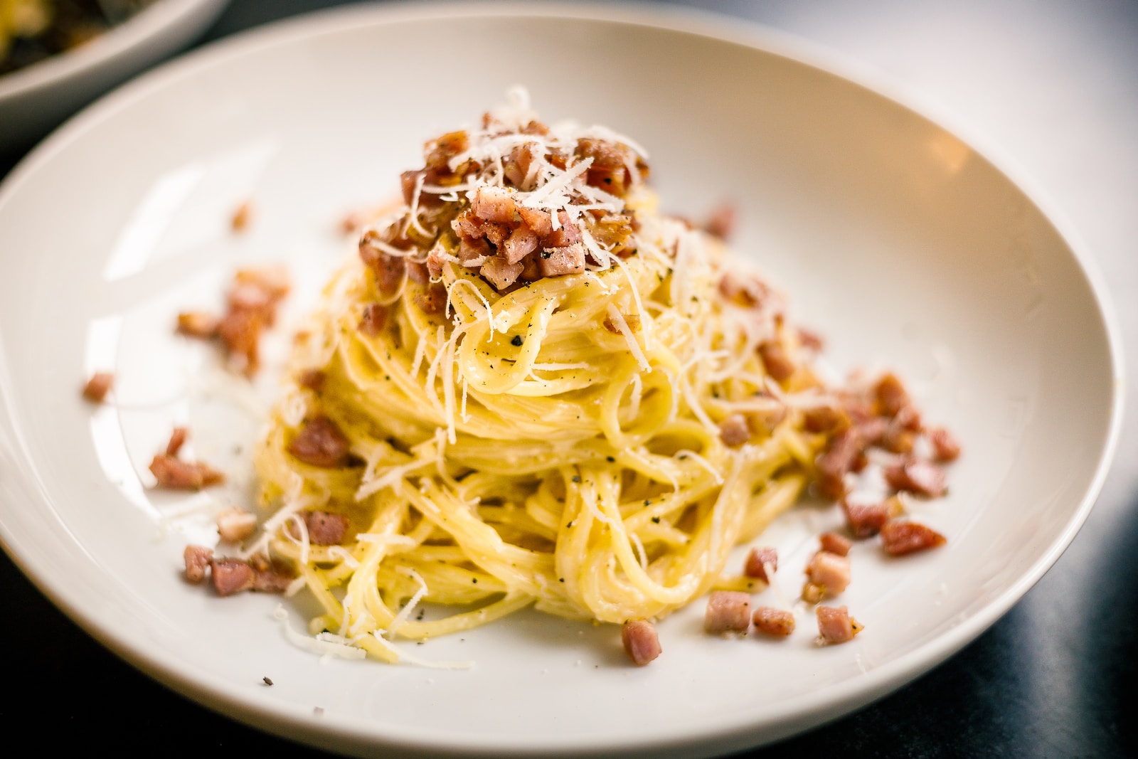 Pasta Carbonara on white ceramic plate